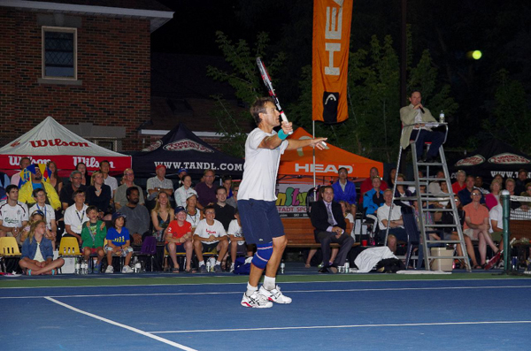 Tennis star Mats Wilander prepares to return a shot in the doubles match, a highlight of the August 6 WOW day.