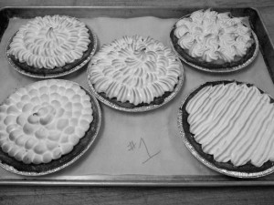 Some of the designs on lemon meringue pies created by baking students practising their piping skills using two different tips, a star tip and a regular circle tip. Photo: Danielle Blais