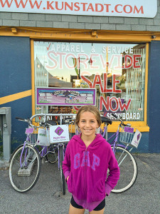 Noémie Pound hanging out in front of Kunstadt Sports, one of the sponsors of the Happy Hearts Fashion Show and Silent Auction, which she is organizing. Proceeds go to support CHEO and the CHEO Research Institute. Photo: Nicola Young